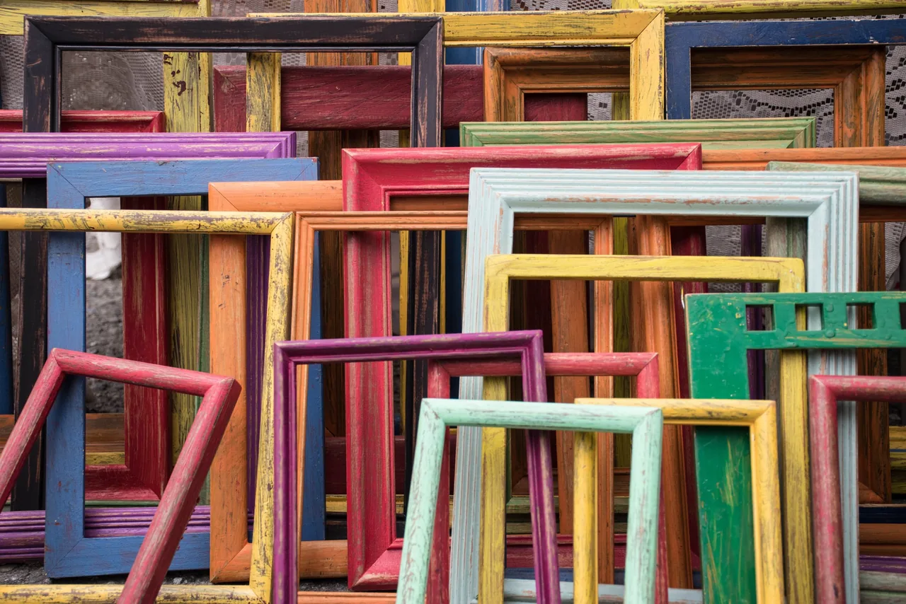 Colorful frame moulding samples arranged in the Dallas gallery