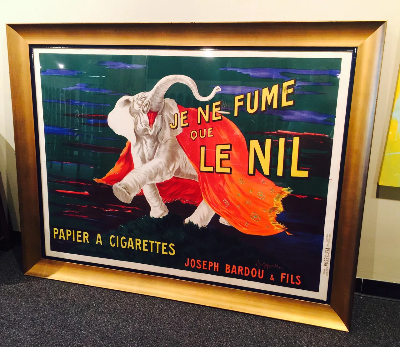 Vintage poster in a gold frame